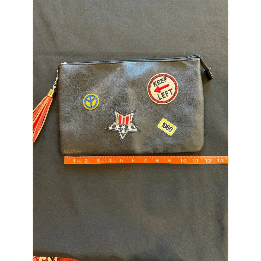 Black Faux Leather Patch Clutch Bag with Tassel Zipper Pull and Interior Pockets